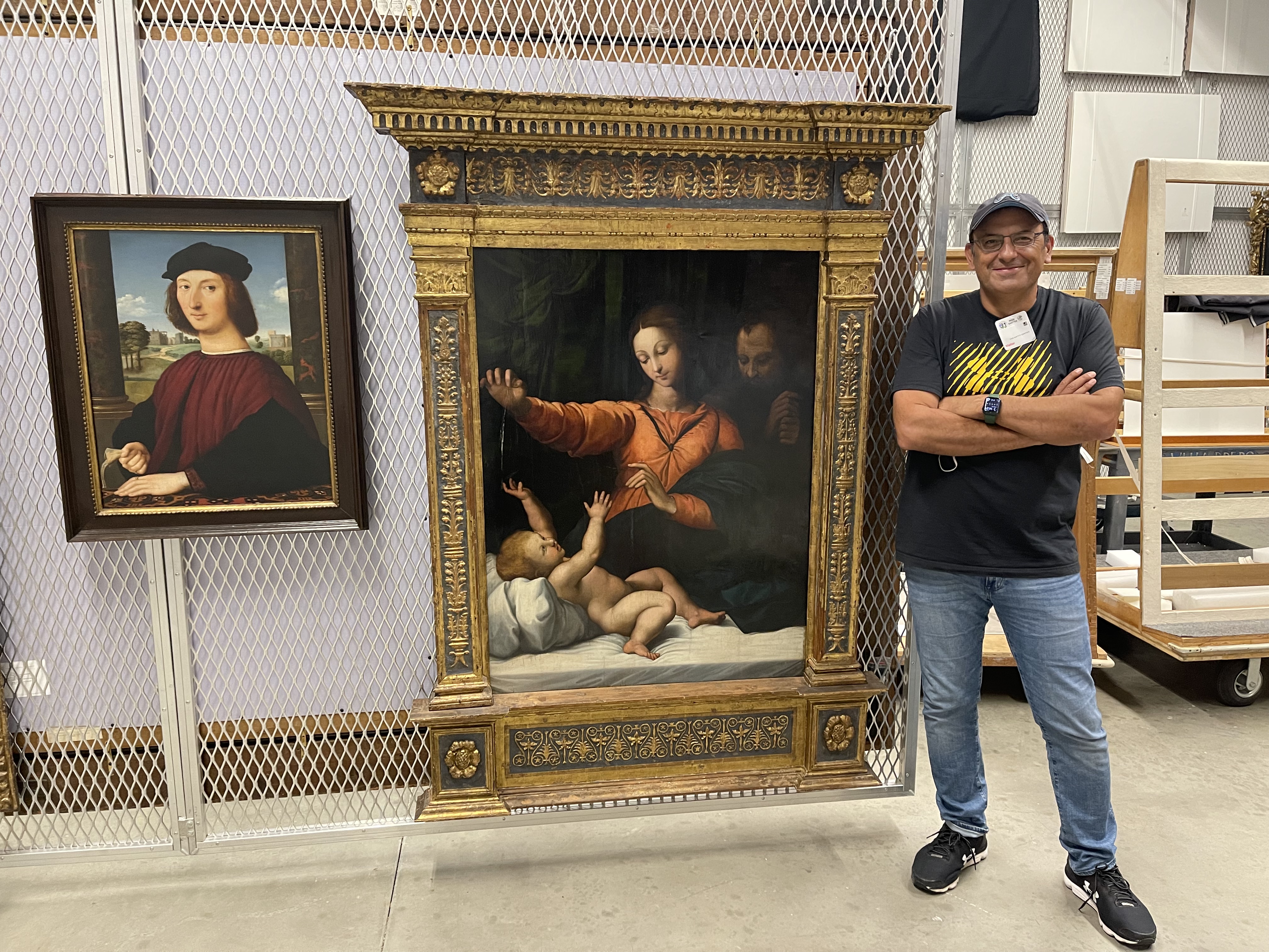 German Estevez with Raphael works in museum storage